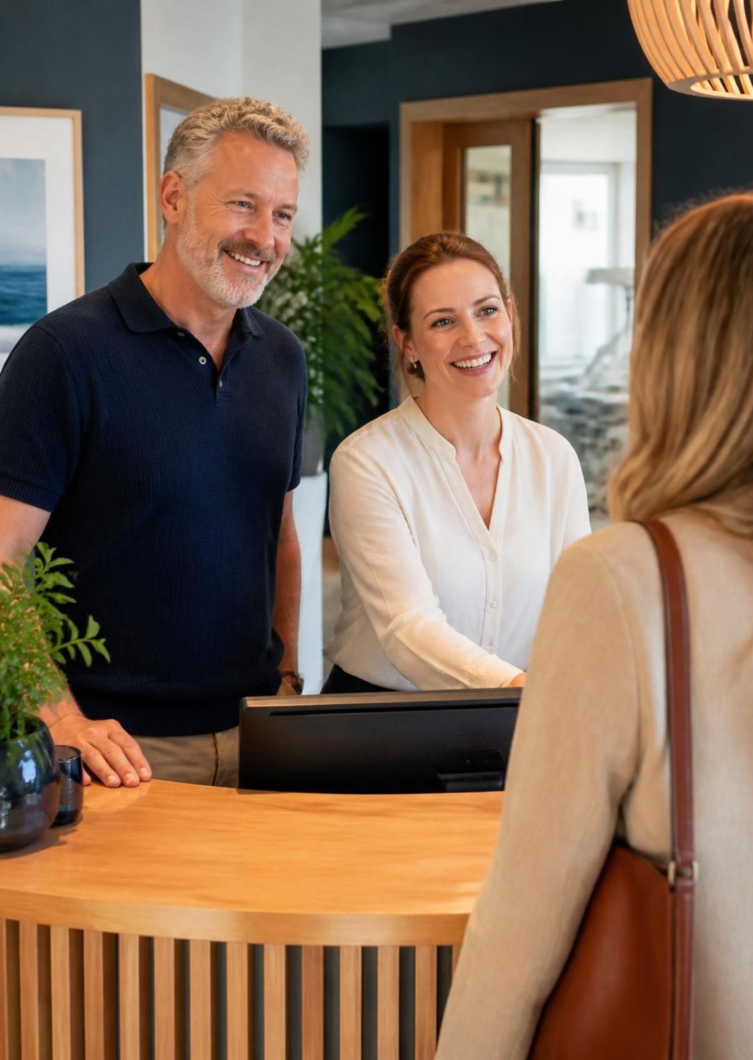 A practice team speaking with a patient